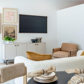 a living room with a tv and a couch