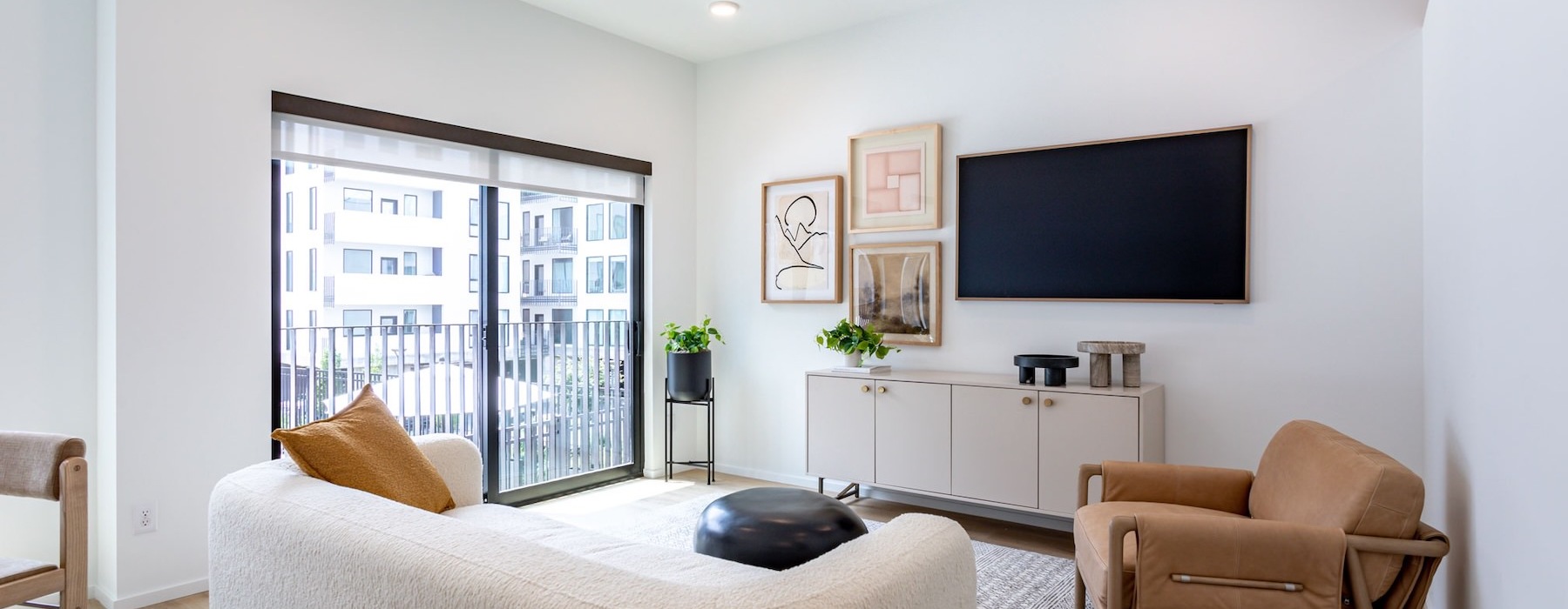 a living room with a tv and a couch